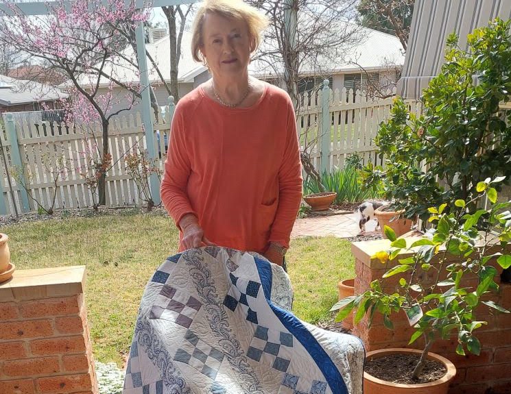 Quilters sew bags full of essentials for women’s refuge