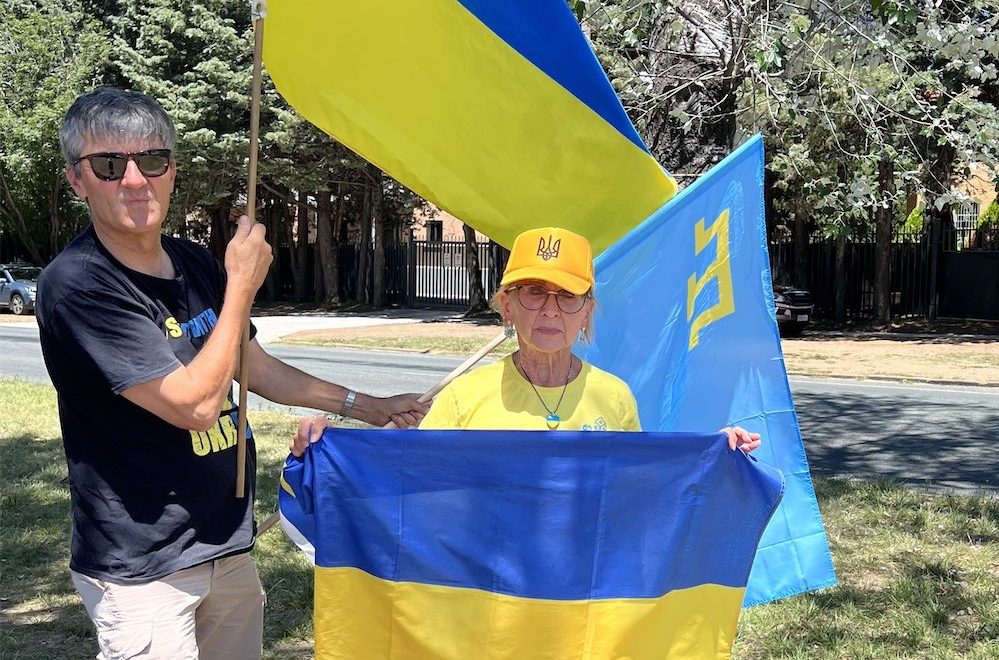 A year on, dogged protesters keep the flag flying 