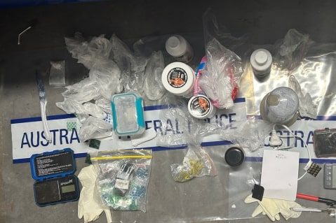 Police raids seize cash and drugs