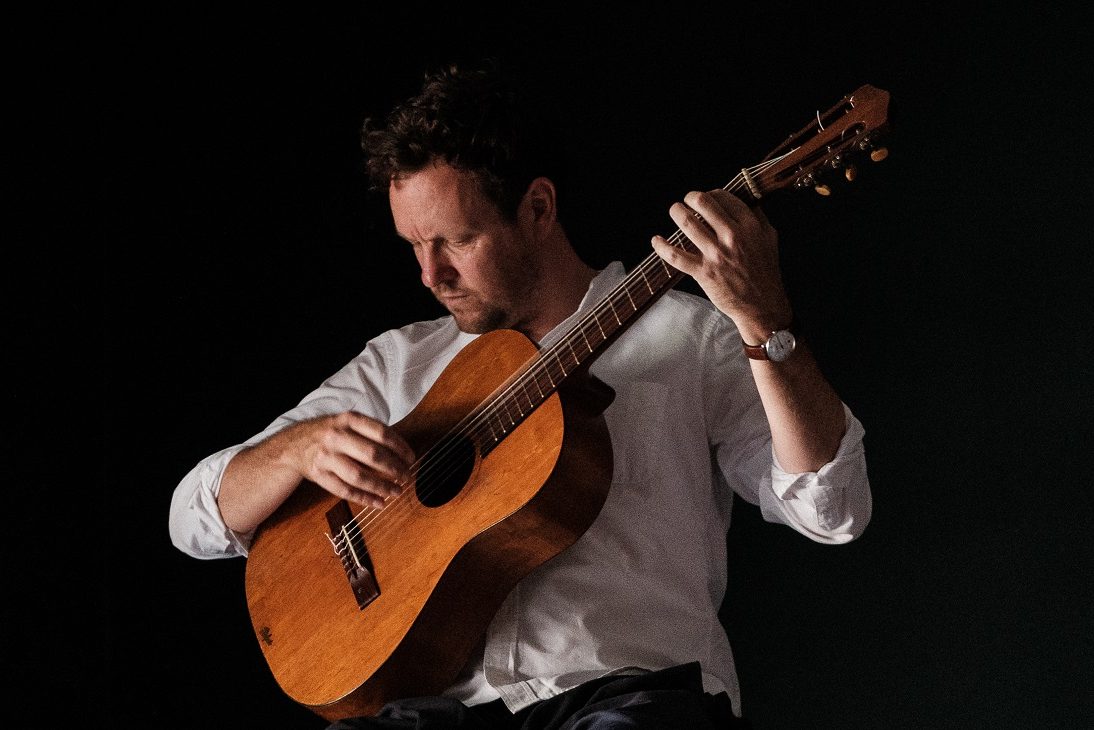Engaging guitarist, one for the musically curious