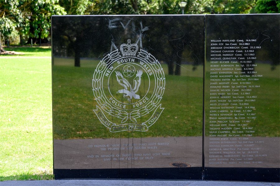 Man charged over vandalism of police tributes memorial