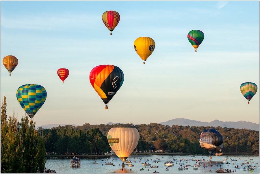 The morning sky fills with Spectacular’s hot-air balloons