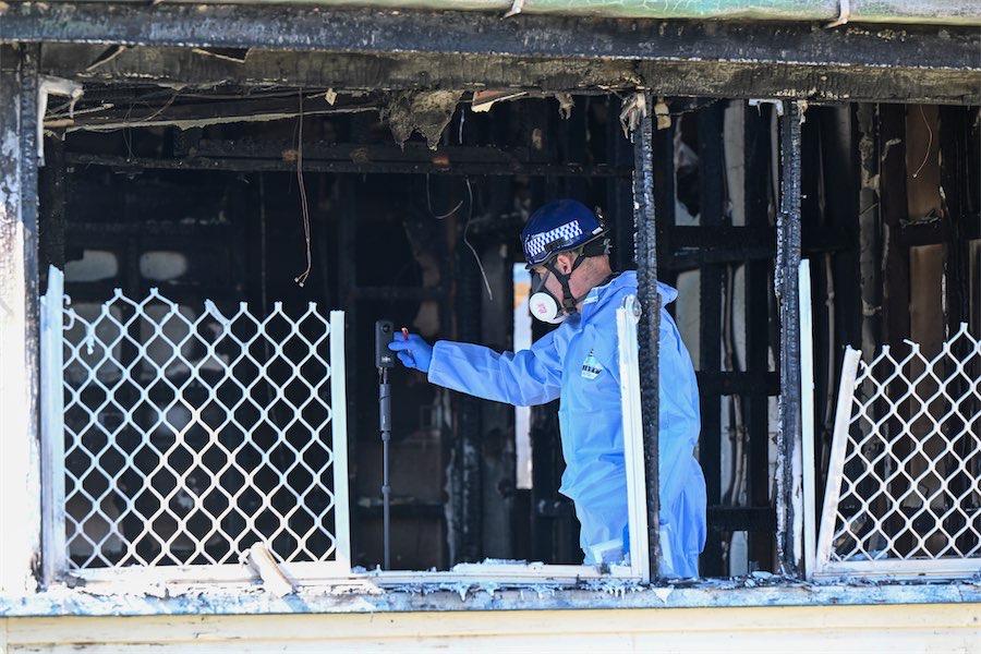 Mum in hospital with three children dead in house fire