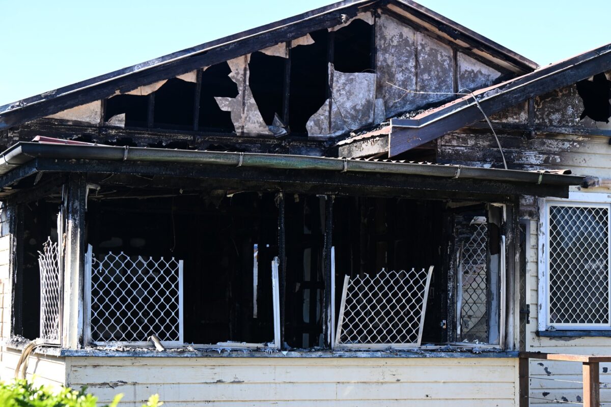 ‘Unimaginable’: mum charged after her kids die in fire