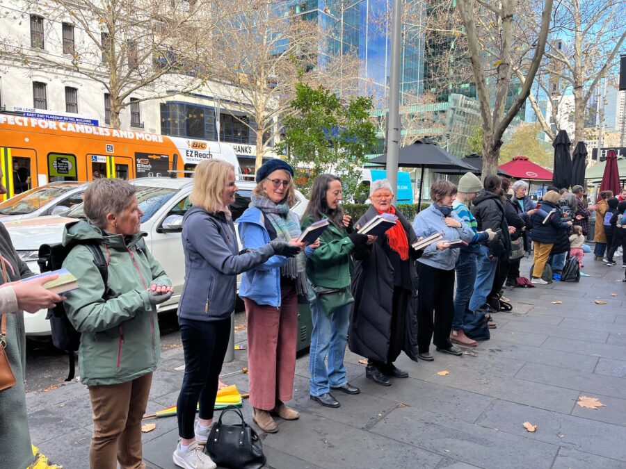 Tome by tome, human chain moves historic bookstore