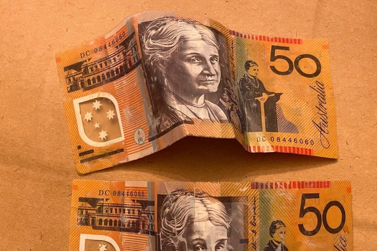 Man charged with using counterfeit notes