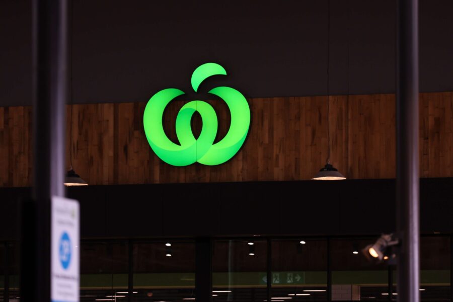 Shoppers check out of Woolies as Coles registers gains