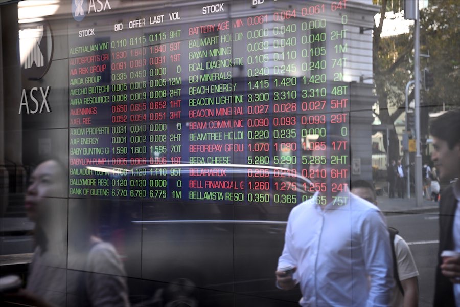 Australian shares peak at new record