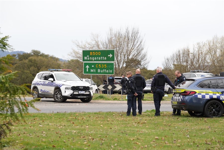 Major search for gunman after police officers shot dead