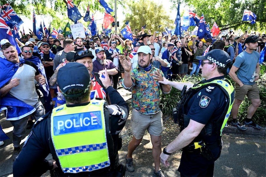 Tensions flare as thousands attend anti-migrant rallies