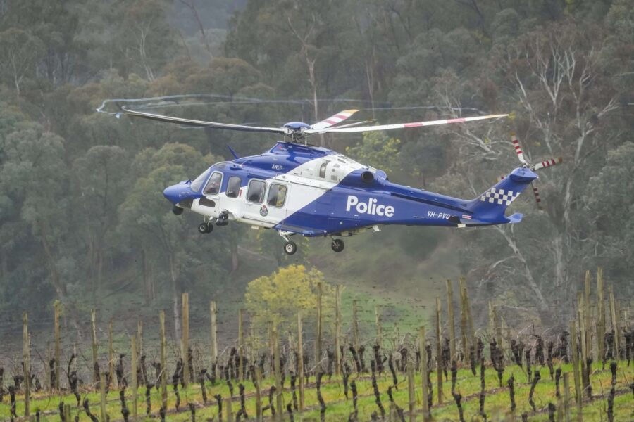 Community fractures as hunt for accused killer drags on