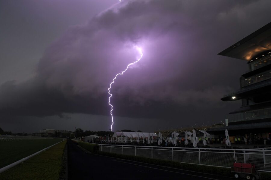 Storms brewing as tributes flow for lightning victim