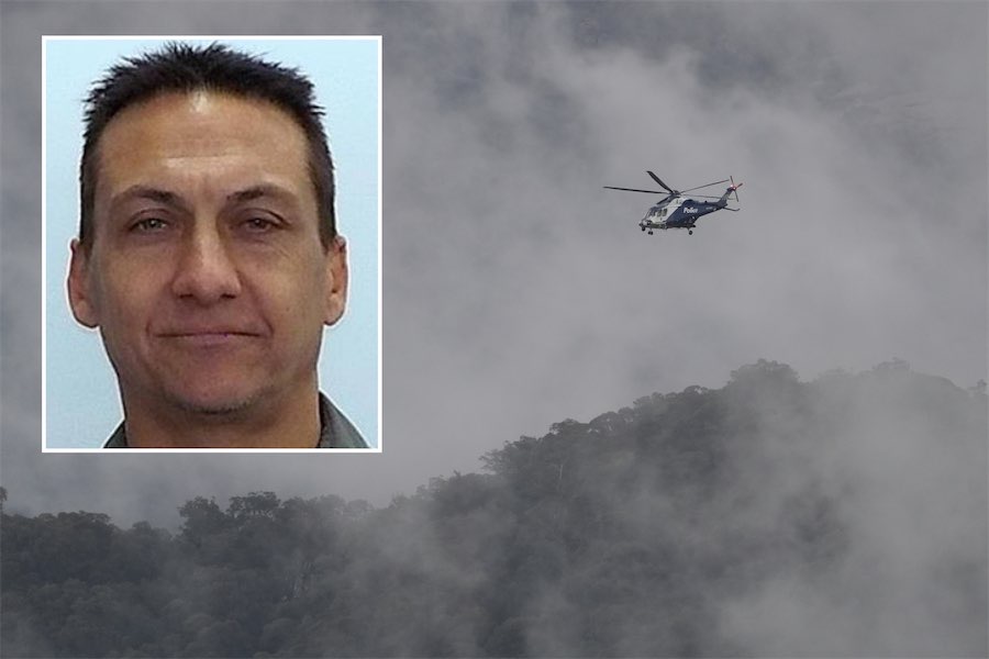 Man cleared of accused killer link as search ramps up