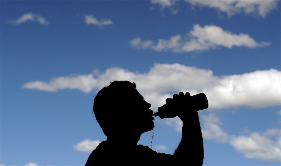 ‘Very sticky’: summer heatwave to give way to storms