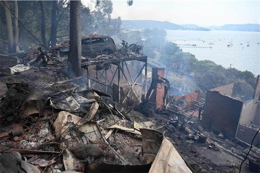 Bushfire battles all but won as summer dials up threat