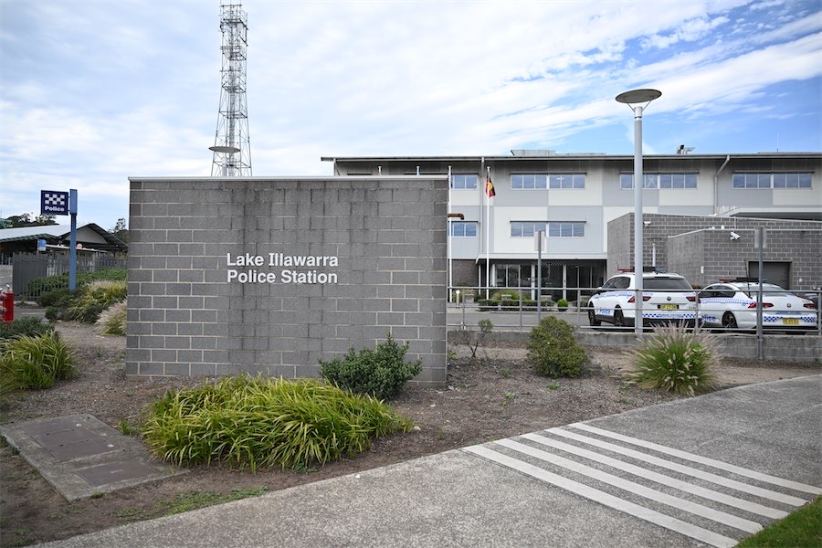 Woman found dead in car parked outside police station