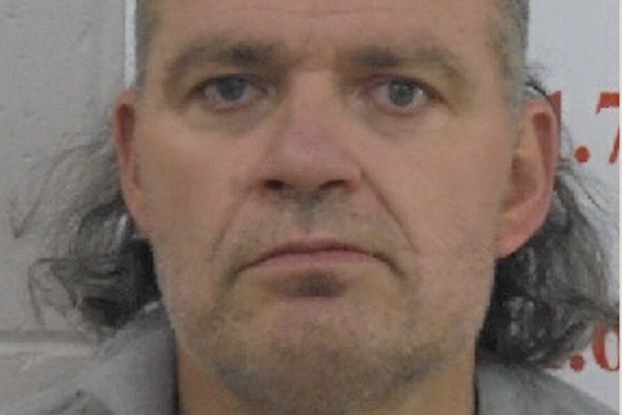 Wanted man may be armed, warn police