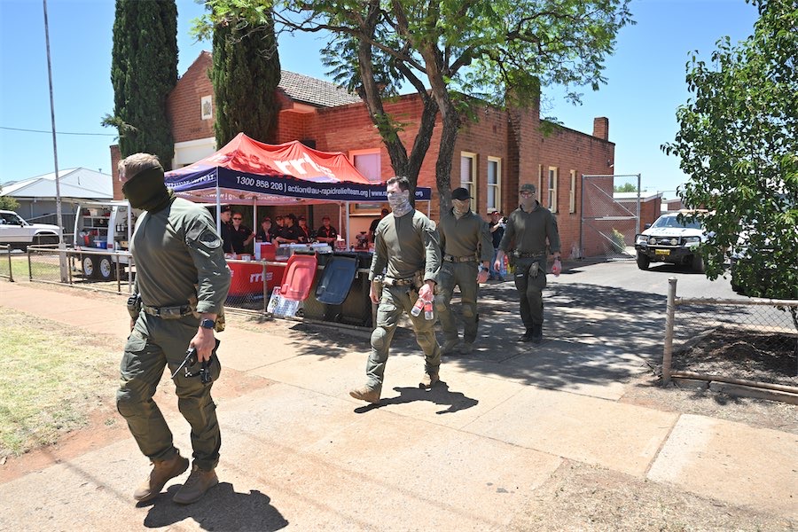 Search widens in manhunt for alleged triple murderer