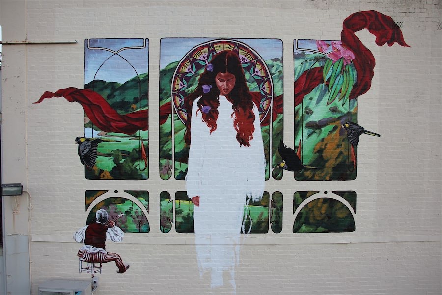 Family salutes artist’s work with mural on building