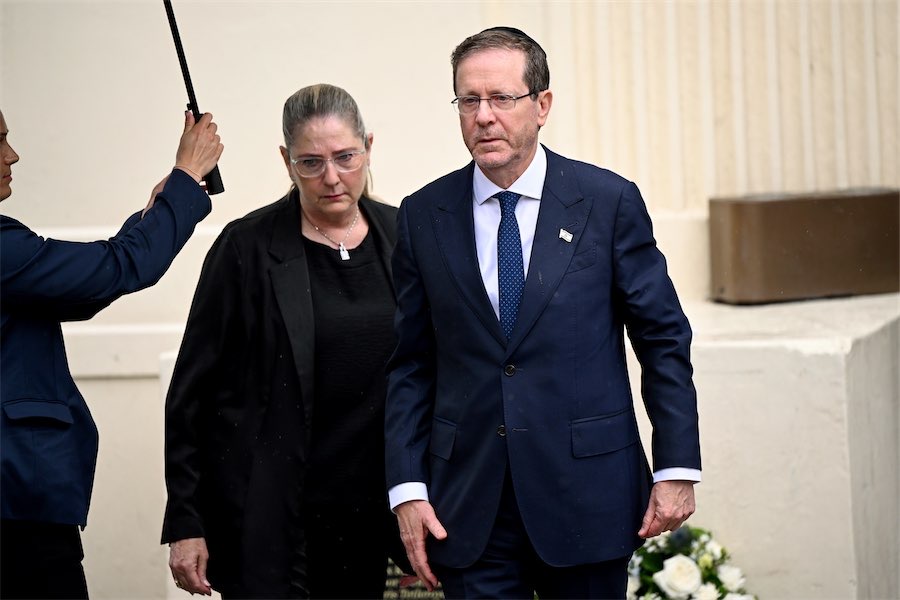Israel’s president visits site of beach terror