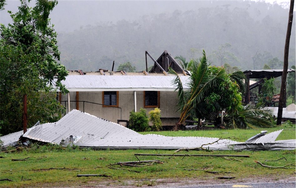Locals await fury as cyclone upgraded to category five