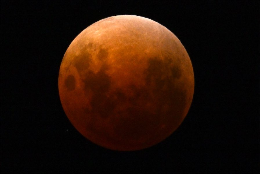 Blood moon wows in final appearance for three years