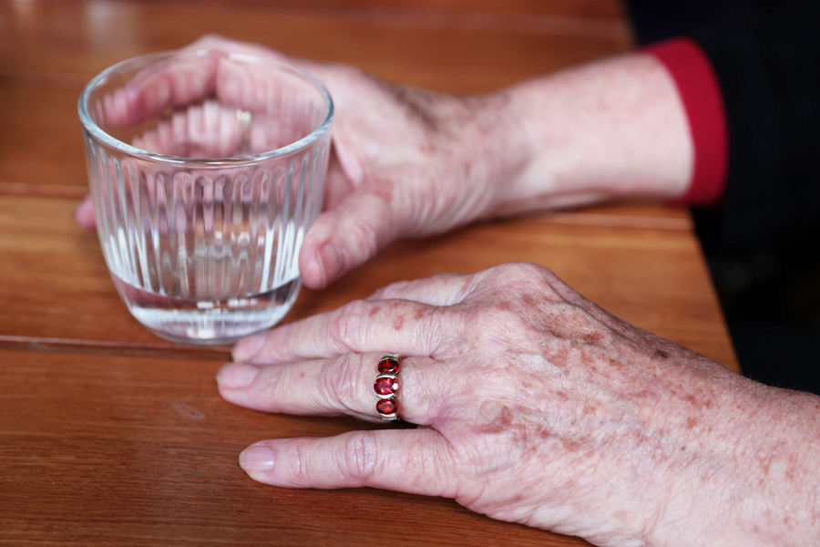Private health rebate cut to fund aged care shower fees