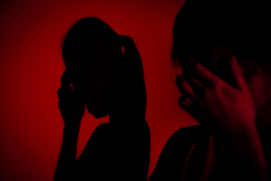 Two charged over separate family violence
