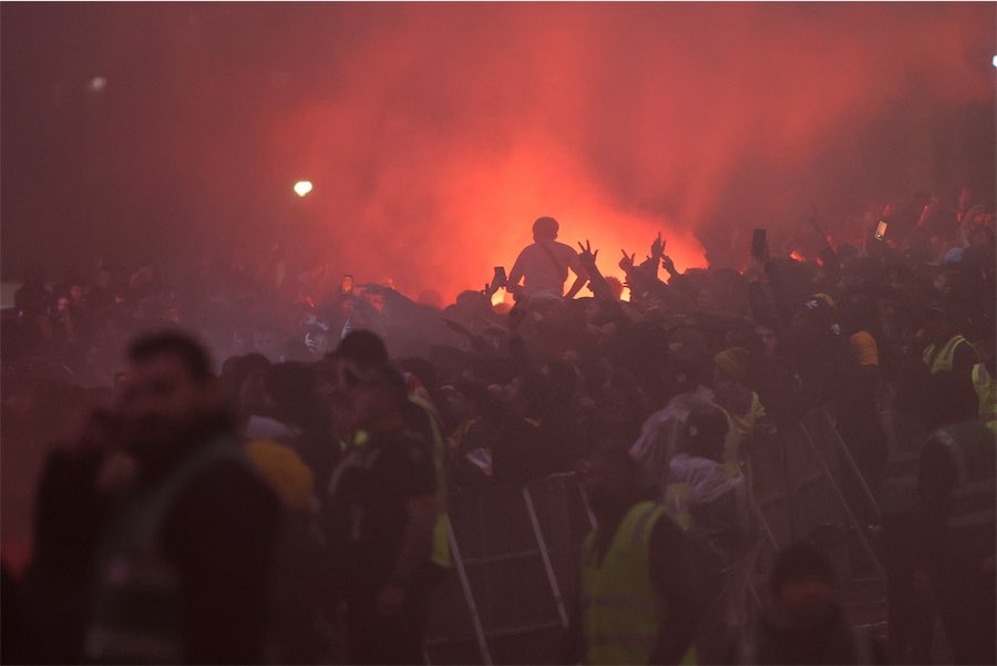 Socceroos fan suffers flare to face in World Cup chaos