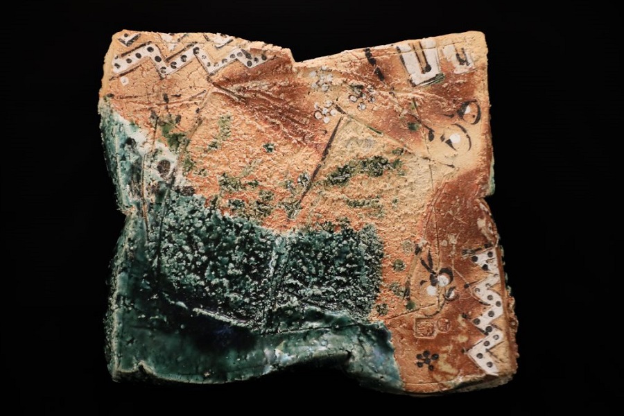Contrasting ceramic styles united by local clay