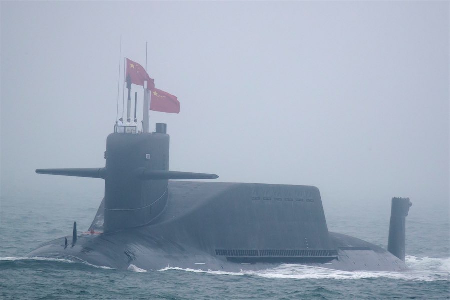 China test fires missile in Pacific as alliance struck