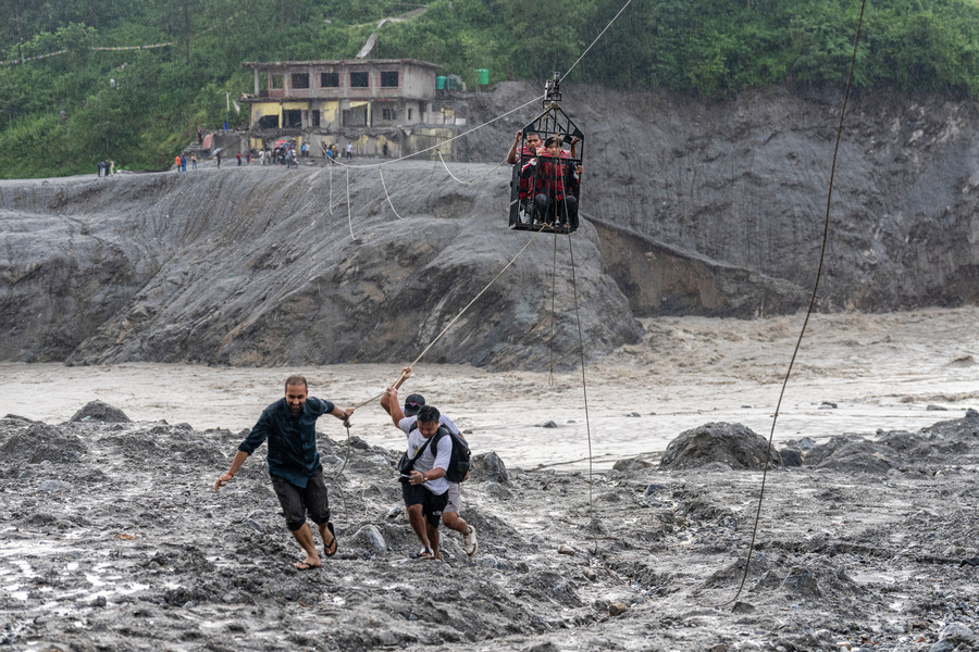 Two Australians found alive in Nepal flood disaster