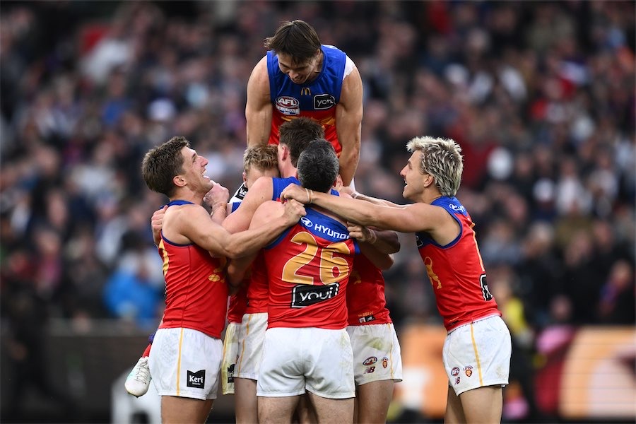 Third time’s the charm as Lions leap into AFL history